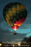 The hot air ballon rises skywards above the Adventure Zone on Friday Evening at the 2010 Riverfest celebration.