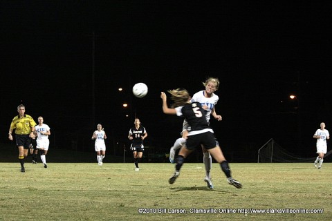 The intensity of the game is evident on the players faces