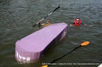 The crew of the CHS boat after it capsized along side the dock.