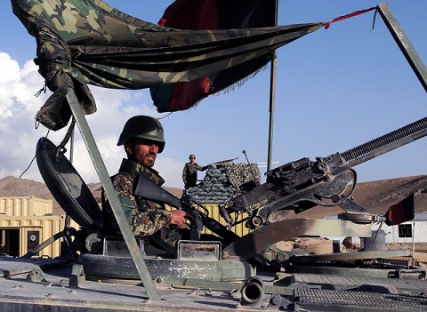 An Afghan National Army soldier stands guard at Forward Operating Base Thunder, one of three bases insurgents attacked in eastern Afghanistan Sept. 24th. (Photo by U.S. Army Staff Sgt. Troy P. Johnson, 304th Public Affairs Detachment)