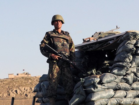 An Afghan National Army soldier stands guard at Forward Operating Base Thunder, one of three bases insurgents attacked in eastern Afghanistan Sept. 24th. (Photo by U.S. Army Staff Sgt. Troy P. Johnson, 304th Public Affairs Detachment)