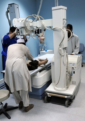 A young boy receives medical care at Paktya Regional Medical Hospital after being injured in an attack on Forward Operating Base Thunder, one of three bases insurgents attacked in eastern Afghanistan Sept. 24th. (Photo by U.S. Army Staff Sgt. Troy P. Johnson, 304th Public Affairs Detachment)