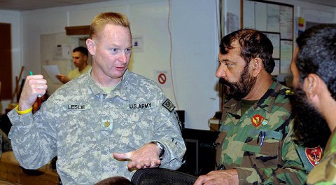 U.S. Army Maj. Mark Leslie, operations officer and native of Chattanooga, TN, 3rd Brigade, 101st Airborne Division, explains the brigade’s intelligence operations to Afghan National Army commandos at the brigade’s tactical operations center Sept. 18th. (Photo by U.S. Army Sgt. Brent C. Powell, 3rd Brigade, 101st Airborne Division)