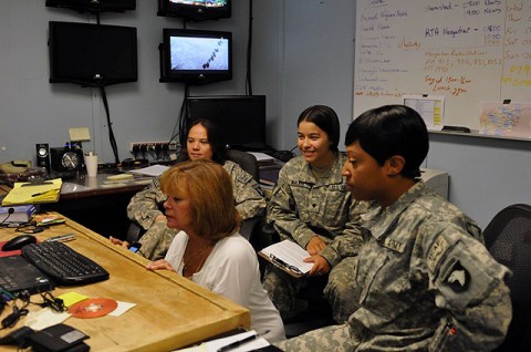 U.S. Army Soldiers at Forward Operating Base Fenty, participates in an online chat session with a teenage female Afghan student in the city of Jalalabad in eastern Afghanistan’s Nangarhar Province Sept. 21st. (Photo by U.S. Army Sgt. Albert L. Kelley, 300th Mobile Public Affairs Detachment)