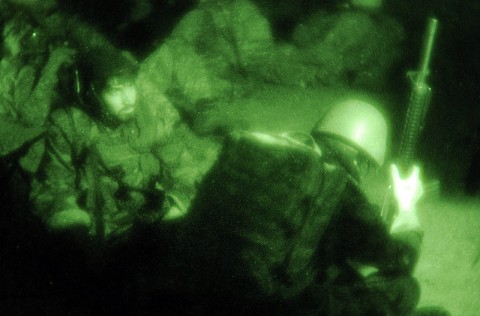 Afghan soldiers with Weapons Company, 2nd Kandak wait for an air assault mission with International Security Assistance Forces. (Photo by U.S. Army Staff Sgt. Gary A. Witte, 300th Mobile Public Affairs Detachment)