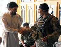 U.S. Army 1st Lt. James D. Horne of Fayetteville, NC, a platoon leader with Company A, 2nd Battalion, 327th Infantry Regiment, Task Force No Slack, shakes hands with a resident of Lar Sholtan village in eastern Afghanistan’s Kunar province Aug. 21st. (Photo by U.S. Army Staff Sgt. Gary A. Witte, 300th Mobile Public Affairs Detachment)