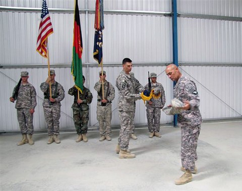 U.S. Army Lt. Col. David Womack, a Roanoke, VA, native, and U.S. Army Command Sgt. Maj. Charles Judd from Fort Campbell, KY, unveil their Red Currahee Battalion colors, officially taking responsibility of western Paktika Province Sept. 10th. (Photo by U.S. Army 1st Lt. R.J. Peek, 3rd Battalion, 187th Infantry, 101st Airborne Division)