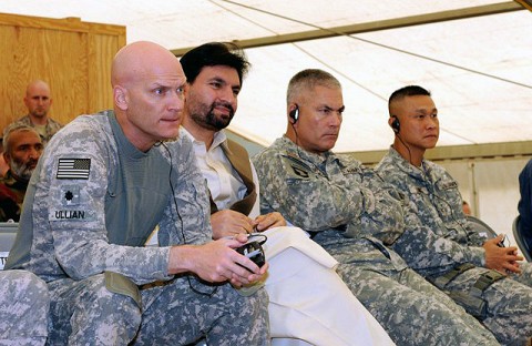 U.S. Army Lt. Col. Richard Ullian (left), commanding officer, 3rd Battalion, 320th Field Artillery Regiment; Naeemi, governor of Khowst Province; U.S. Army Maj. Gen. John Campbell, commanding general, 101st Airborne Division; and U.S. Army Col. Viet Luong, commanding officer, 3rd Brigade, 101st Airborne Division, from Fort Campbell, KY, listen in at a recent Election Combined Arms Rehearsal meeting Sept. 15th at Forward Operating Base Salerno. (Photo by U.S. Army Sgt. Brent C. Powell, 3rd Brigade, 101st Airborne Division)