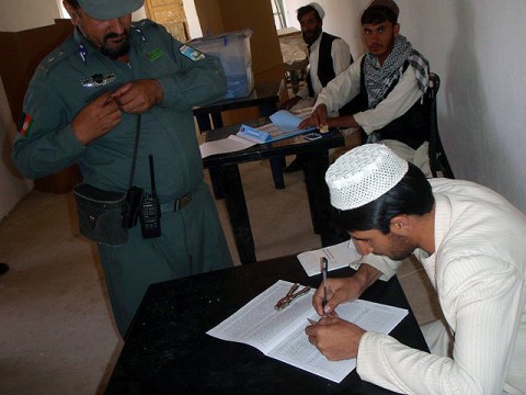 Deh Yak’s police chief, Haji Faiz Mohammad Tufan, prepares to cast his vote Sept. 18th at the Ramak Mosque polling center. Task Force Iron Rakkasan assisted the Afghan government and the Afghan National Security Forces in eastern Ghazni Province to provide for safe and legitimate polling. (Photo by U.S. Army 1st Lt. R.J. Peek, 3rd Battalion, 187th Infantry, 101st Airborne Division)