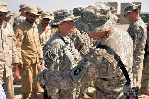 U.S. Army Lt.Col. William B. Johnson of Bruceton, TN, Task Force Panther commander, and U.S. Army Command Sgt. Maj. Anthony R. Broadhead of Clarksville, TN, uncased their battalion colors at Forward Operating Base Connolly in the Nangarhar Province, Afghanistan, Sept. 14. Included in the ceremony was a combat patch ceremony recognizing the Soldiers first 30 days in theater. (Photo by U.S. Army Spc. Richard Daniels Jr.,Task Force Bastogne Public Affairs)