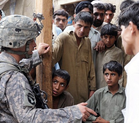 U.S. Army 1st Lt. Rob L. Schenker of Long Island, NY, platoon leader for 1st Platoon, Company B, 2nd Battalion, 327th Infantry Regiment, Task Force No Slack, talks to residents of Kutgay village in eastern Afghanistan's Kunar province. In addition to defending nearby Combat Outpost Badel, the unit regularly engages with the population and works with the local government to improve the quality of life for residents. (Photo by U.S. Army Staff Sgt. Gary A. Witte, 300th Mobile Public Affairs Detachment)