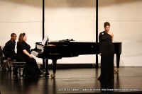 Joy Schreier playing the piano during the performance