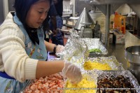 One of the volunteers helps get the fresh ingredients ready for transport to the demonstration area at APSU