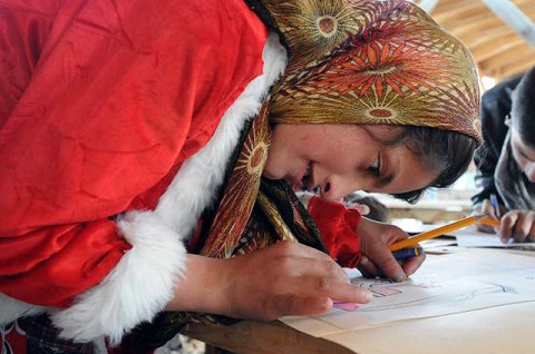 An Afghan child participates in a new literacy program at the Egyptian Field Hospital here Oct. 28th. (Photo by U.S. Army Staff Sgt. Whitney Hughes, Task Force Wolverine Public Affairs, 86th Infantry Brigade Combat Team (Mountain))