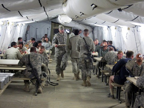 Dining facilities at Forward Operating Base Andar provide an indoor eating area for the Soldiers to enjoy their meals. Over time, a mobile mess tent was established for Soldiers to receive prepared meals, and Soldiers ate wherever they could find a spot to sit until tents were established to provide an enclosed area to eat. (Photo by U.S. Army 1st Lt. R.J. Peek, 3rd Battalion, 187th Infantry, 101st Airborne Division)