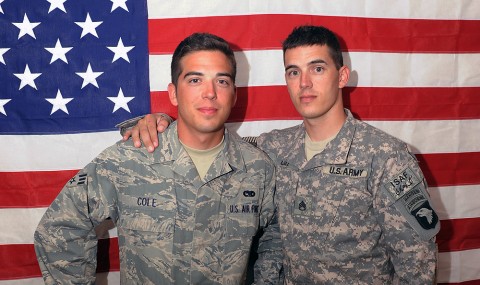 U.S. Air Force Senior Airman William Ashton Cole (left), a member of the 336th Aircraft Maintenance Unit, and U.S. Army Staff Sgt. Jonathan Cole (right), a member of the 101st Airborne Division, stand together at Bagram Airfield, Afghanistan. The Gastonia, NC natives are brothers and currently serving in Afghanistan.(U.S. Air Force Photo/Tech. Sgt. Drew Nystrom)