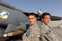 U.S. Army Staff Sgt. Jonathan Cole (left), a member of the 101st Airborne Division, and U.S. Air Force Senior Airman William Ashton Cole (right), a member of the 336th Aircraft Maintenance Unit, stand together in front of a F-15E Strike Eagle assigned to 455th Air Expeditionary Wing at Bagram Airfield, Afghanistan. (U.S. Air Force Photo/Tech. Sgt. Drew Nystrom)