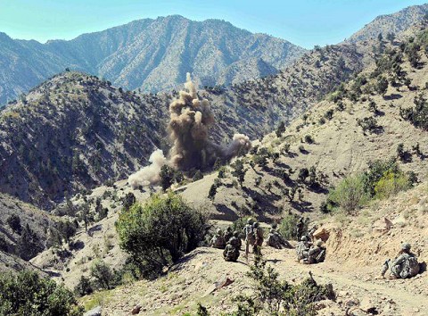 U.S. Army Soldiers assigned to Troop A, 1st Squadron, 33rd Cavalry Regiment, watch as explosives detonate inside an insurgent weapon cache during a joint air-assault mission with Afghan National Security Forces in the mountains of Khowst Province Oct. 8th. (Photo by U.S. Army Staff Sgt. Brent C. Powell, 3rd Brigade, 101st Airborne Division)