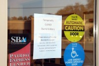 Sign posted on the door after the robbery