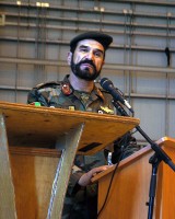 Afghan Air Force Brig. Gen. Mohammed Barat, Kabul wing commander, gives a speech during a transfer of authority ceremony Oct. 9th at Kabul International Airport. (Photo by U.S. Army Sgt. Monica K. Smith, 3rd Combat Aviation Brigade, Task Force Falcon)