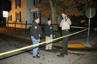 Sgt Cutler, Det Barrett, and Det Jobe processing the scene.