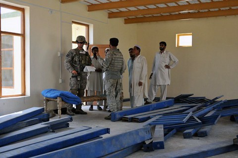 U.S. Army Capt. Klayton D. Barrows, of Corpus Christi, Texas, a platoon leader with 2nd Platoon, Company D, 2nd Battalion, 327th Infantry Regiment, Task Force Spartan, verifies the presence of weaving loom equipment at a newly built carpet factory in Chek Nawar Village of La Por District in eastern Afghanistan’s Nangarhar Province Sept. 23rd. (Photo by U.S. Army Sgt. Albert L. Kelley, 300th Mobile Public Affairs Detachment)