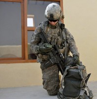 U.S. Army Pfc. Eric C. Holmes, of Medford, OR, 2nd Platoon, Company D, 2nd Battalion, 327th Infantry Regiment, Task Force Spartan, uses a Dagger, a GPS device, to ascertain a grid coordinate of his platoon’s location, Sept. 23rd. Holmes’s unit was performing a quality assessment and quality control inspection of a carpet factory in Chek Nawar Village of La Por District in eastern Afghanistan’s Nangarhar Province. (Photo by U.S. Army Sgt. Albert L. Kelley, 300th Mobile Public Affairs Detachment)