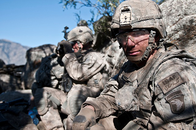 U.S. Army Pfc. Nick A. Flowerday (right), an infantryman from Burlingame, CA, and U.S. Army Cpl. Robert Chauncey, an infantry team leader from McKinney, Texas, Task Force No Slack, provide over watch for a combat logistics patrol from their fighting position on a remote hilltop in the Shal Valley in eastern Afghanistan’s Nuristan Province Nov. 9th. (Photo by U.S. Army Staff Sgt. Mark Burrell, 210th Mobile Public Affairs Detachment)