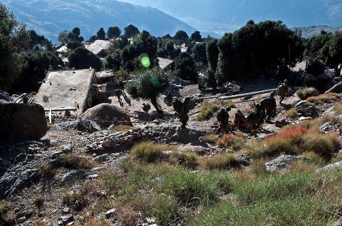 Soldiers from Company B, 1st Battalion, 327th Infantry Regiment, Task Force Bulldog team up with their Afghan National Army counterparts to clear another village during Operation Bulldog Bite above the Pech River Valley in eastern Afghanistan’s Kunar Province Nov. 23rd. (Photo by U.S. Army Staff Sgt. Mark Burrell, Task Force Bastogne Public Affairs)