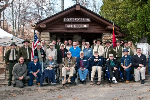 Environment and Conservation Commissioner Jim Fyke (center) joined former CCC workers from across the state, along with Tennessee State Parks officials, at Pickett State Park’s dedication of the new Civilian Conservation Corps Museum. (Photo by Terry Bonham) Environment and Conservation Commissioner Jim Fyke (center) joined former CCC workers from across the state, along with Tennessee State Parks officials, at Pickett State Park’s dedication of the new Civilian Conservation Corps Museum. (Photo by Terry Bonham)