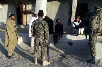 Soldiers from the Afghan National Army speak with the local villagers in the Charbaran District here Oct. 27th during Task Force White Currahee Toccoa Tikurah, the largest combined air assault mission 4th Brigade has conducted this year in the province. (Photo by U.S. Army Spc. Lorenzo Ware, Task Force Currahee Public Affairs)