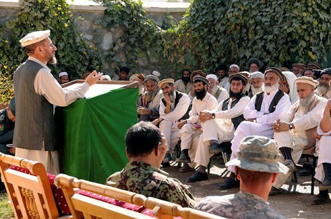 Narang District Sub-Gov. Haji Gulam Nabi addresses village elders at the Narang District Center here Nov. 2 during the Security and Development Shura. More than 100 village elders from across the district attended the Shura. (Photo by U.S. Air Force Capt. Peter Shinn, 734th Agribusiness Development Team)