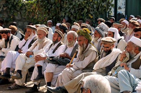 Narang District village elders listen during the Security and Development Shura at the district center here Nov. 2. More than 100 village elders from across the district attended the shura.  (Photo by U.S. Air Force Capt. Peter Shinn, 734th Agribusiness Development Team)