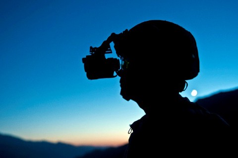 NURISTAN PROVINCE, Afghanistan – “It’s kind of nice seeing those same old mountains,” said U.S. Army Sgt. James T. Schmidt, Task Force No Slack, while looking through his night vision goggles as the sun sets from a hilltop in the Shal Valley in eastern Afghanistan's Nuristan Province, Nov. 8th. This is Schmidt’s second combat tour to the same region in Afghanistan. (Photo by U.S. Army Staff Sgt. Mark Burrell, 210th Mobile Public Affairs Detachment)