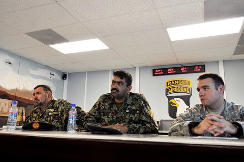 (From left) Afghan National Army Maj. Abdur, 2nd Brigade engineer, and Maj. Abdullateef, brigade plans officer, attend a meeting to discuss future operations with U.S. Army Capt. Jeffrey Sowecke of Brecksville, Ohio, 2nd Battery, 320th Field Artillery Regiment. (Photo by U.S. Air Force Master Sgt. Matthew S. Osborn, Task Force Bastogne Public Affairs)