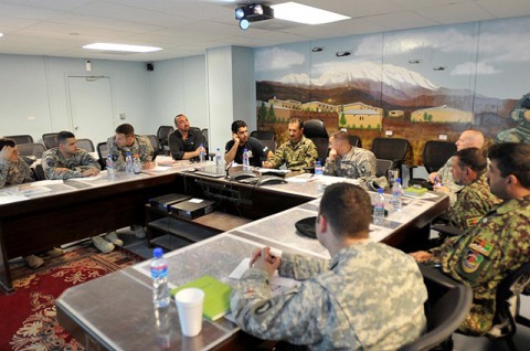 Members from the Afghan National Army and Task Force Bastogne meet to discuss plans for future operations in Nangarhar, Nuristan, Kunar and Laghman provinces on Nov. 10th. (Photo by U.S. Air Force Master Sgt. Matthew S. Osborn, Task Force Bastogne Public Affairs)