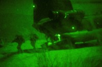 At more than 7,000 feet, Afghan National Army soldiers and Soldiers assigned to Company B, 1st Battalion, 327th Infantry Regiment, Task Force Bulldog, exit a CH-47 Chinook helicopter on top of a mountain overlooking the Pech River Valley in eastern Afghanistan's Kunar Province Nov. 23rd. The joint operation was to clear the mountain villages of insurgent activity. (Photo by U.S. Army Staff Sgt. Mark Burrell, Task Force Bastogne Public Affairs)