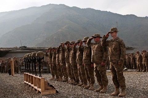 Soldiers assigned to Abu Company, 1st Battalion, 327th Infantry Regiment (Task Force Bulldog), 1st Brigade Combat Team, 101st Airborne Division, render a final salute to their six fallen brethren during a memorial service at Combat Outpost Honikker Miracle in eastern Afghanistan’s Kunar Province Nov. 21st. (Photo by U.S. Army Staff Sgt. Mark Burrell, Task Force Bastogne Public Affairs)