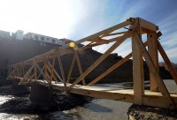 Soldiers from the 2nd and Mortar Platoons of Troop A, 1st Squadron, 172nd Cavalry Regiment, built a 150-foot bridge for the residents of Ghorband District and finished Nov. 10th. (Photo by U.S. Army Staff Sgt. Whitney Hughes, Task Force Wolverine Public Affairs, 86th Infantry Brigade Combat Team)