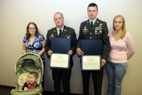 Anderson and Hartberger with their families