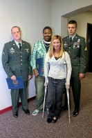 The three men responsible for pulling Amy Fetter out of the vehicle (Left) Robert Anderson, (Center) Diamond Dillard and (Right) Brian Hartbarger with Amy Fetter