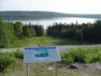 The Interpretive sign for tthe Arrow Air Flight 1285 memorial at Gander Lake