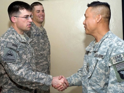 U.S. Army Col. Viet Luong (right) of Fort Campbell, Ky., Task Force Rakkasan commander, greets Paktya Provincial Reconstruction Team members U.S. Army 1st Lt. Brendan Hischar (left), from Fort Worth, Texas, and U.S. Air Force Tech. Sgt. Richard Williams from Gaithersburg, Mass., at Forward Operating Base Gardez Dec. 8th. (Photo by U.S. Air Force Staff Sgt. Barry Loo, Paktya Provincial Reconstruction Team Public Affairs)