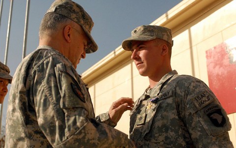 Army Chief of Staff Gen. George Casey pins a Silver Star Medal on U.S. Army Spc. Nicholas Robinson of Tacoma, WA, Company D, 1st Battalion, 187th Infantry Regiment, 3rd Brigade Combat Team, 101st Airborne Division, during a ceremony at Forward Operating Base Salerno Dec. 23rd. (Photo by U.S. Army Pfc. Christopher McKenna, Task Force Rakkasan Public Affairs)