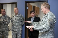 During a tour Nov. 30th before the official ribbon cutting ceremony, The Surgeon General and the Commanding General United States Army Medical Command Lt. Gen. Eric B. Schoomaker tells 101st Division (Air Assault) and Fort Campbell senior acting commander Maj. Gen. Francis J. Wiercinski, Blanchfield Army Community Hospital commander Col. John P. Cook and Screaming Eagle Medical Home Group Practice Manager Ken Russell how the Screaming Eagle Medical Home is the first of its kind and will