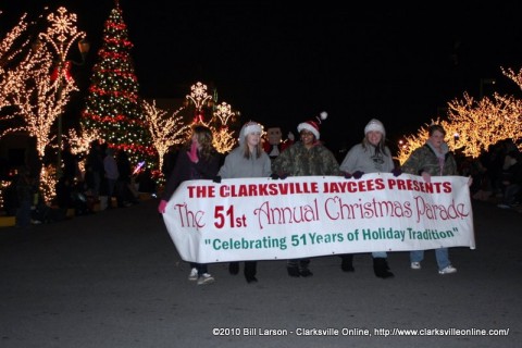 The Clarksville Jaycees banner leads off the annual Christmas Parade