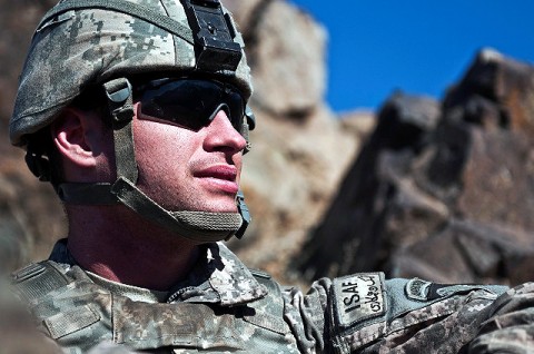 U.S. Army Spc. Joshua R. Wood, a mortarman from Pontotoc, MS, assigned to Company B, 2nd Battalion, 327th Infantry Regiment, Task Force No Slack, 1st Brigade Combat Team, 101st Airborne Division, pulls security on a mountainside overlooking the Ganjgal Valley in eastern Afghanistan Dec. 11th. (Photo by U.S. Army Staff Sgt. Mark Burrell, Task Force Bastogne Public Affairs)