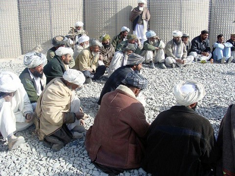 Twenty-seven village elders gathered Dec. 21st at Forward Operating Base Bande Sardeh in eastern Andar District to discuss an agreement to keep the Taliban out of their villages. The signing of the pact is one step towards security in Bande Sardeh and enables the Afghans to protect themselves.  (Photo by U.S. Army Spc. Dustin Mullis, Company B, 3rd Special Troops Battalion)