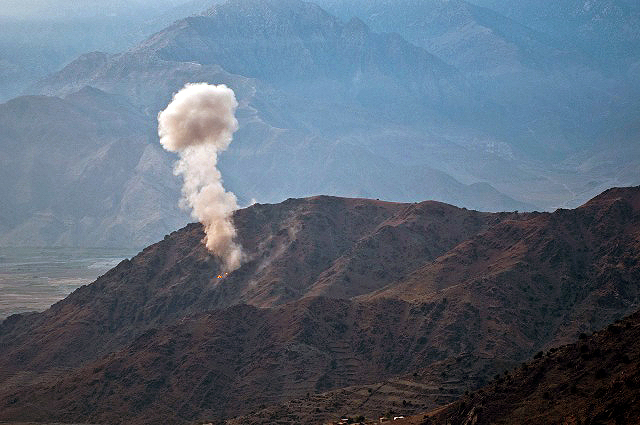 During Operation Eagle Claw II, artillery fire explodes on a suspected insurgent hideout as Soldiers from Bayonet Company, 2nd Battalion, 327th Infantry Regiment, Task Force No Slack, have a bird’s-eye view on a mountainside overlooking the Ganjgal Valley in eastern Afghanistan’s Kunar Province, Dec. 10th. Eleven insurgents were killed during the two-day operation. (Photo by U.S. Army Staff Sgt. Mark Burrell, Task Force Bastogne Public Affairs)