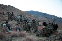 U.S. Army Soldiers of Headquarters and Headquarters Company, 2nd Battalion, 327th Infantry Regiment, and Afghan National Army soldiers of 2nd Company, Command Outpost Penich, take a break along the way to their objective during Joint Operation Eagle Claw II in Kunar Province Dec. 10th. (Photo by U.S. Army Spc. Andy Barrera, Task Force Bastogne)